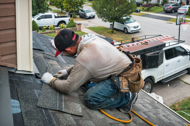 Professional Storm Damage Roof Repair technician working in East Setauket, NY